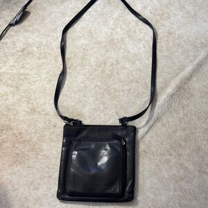 Fossil Black Leather Crossbody Bag
Unisex built in zippered wallet great travel